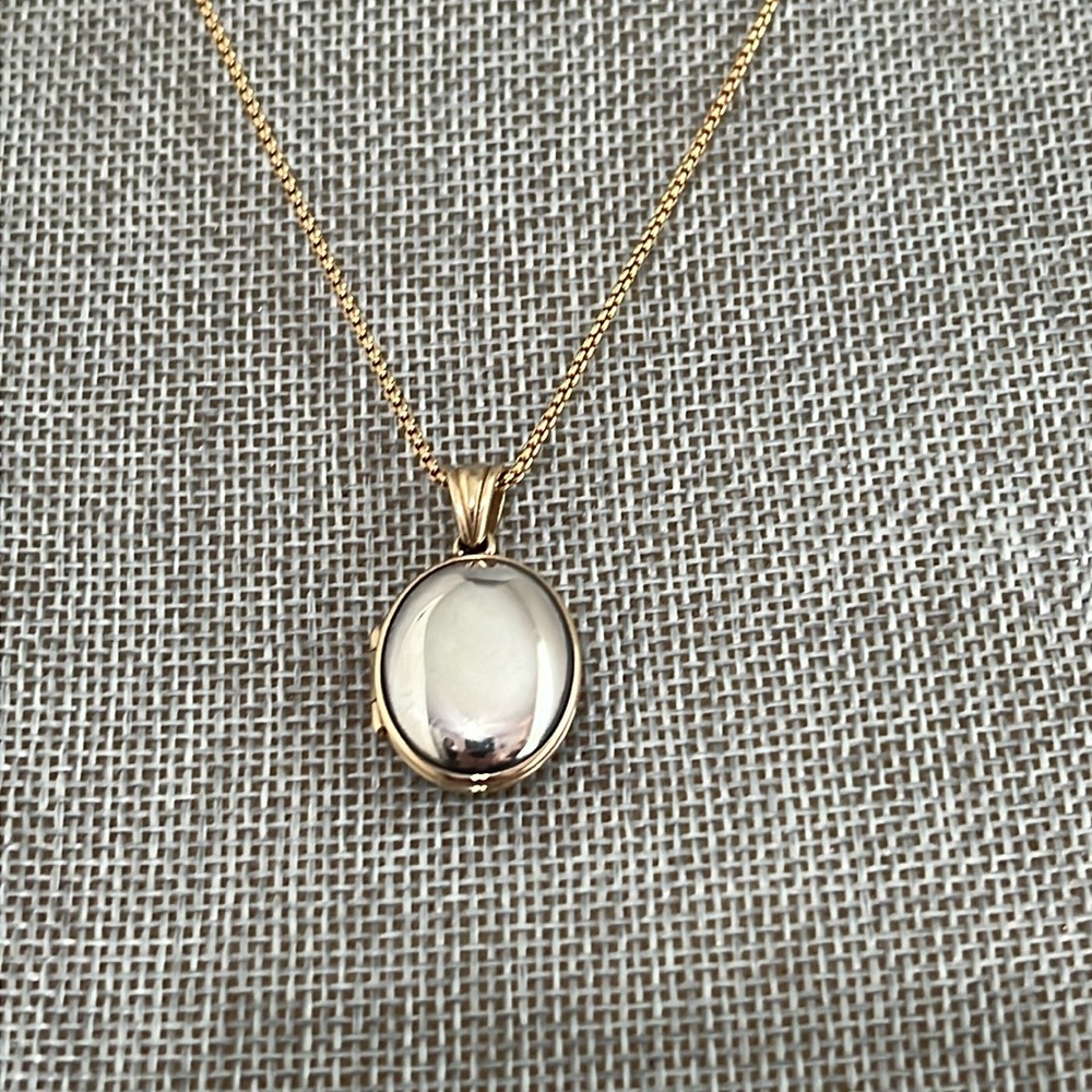 Retired James Avery Sterling and 14K Gold Oval Locket